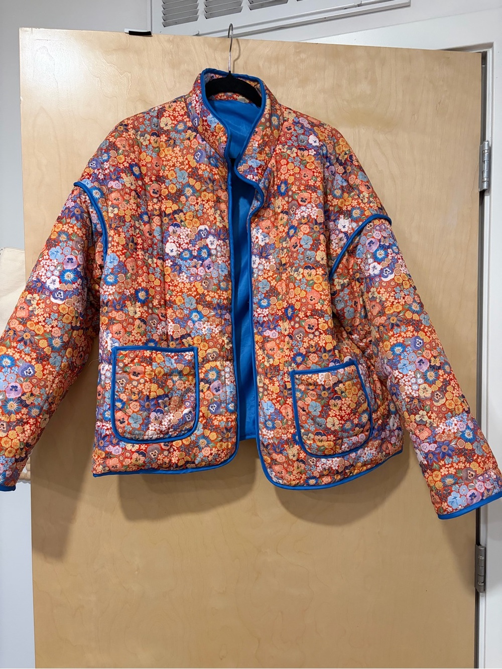 Quilted Floral Jacket in Orange with Blue Trim